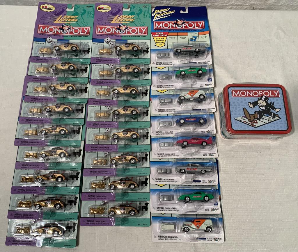 lot of 20+ '00 & '01 Monopoly Johnny Lightning: 2000 Monopoly is K-B Toys, 2001 are others, also a Monopoly tin box sealed with candy, box 124