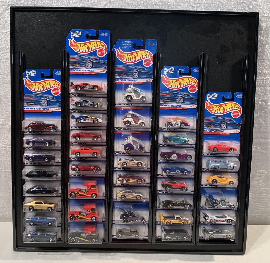 Hot Wheels display w/ 39 1999 1st Edition cars: cars # 1-26 w/ variations, 24 1/2" X 24 1/2"