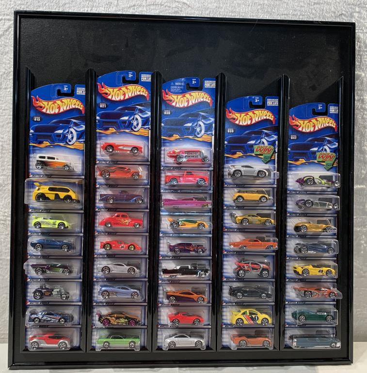 Hot Wheels display w/ 42 2002 Hot Wheels: cars # 13-54, 24 1/2" X 24 1/2"