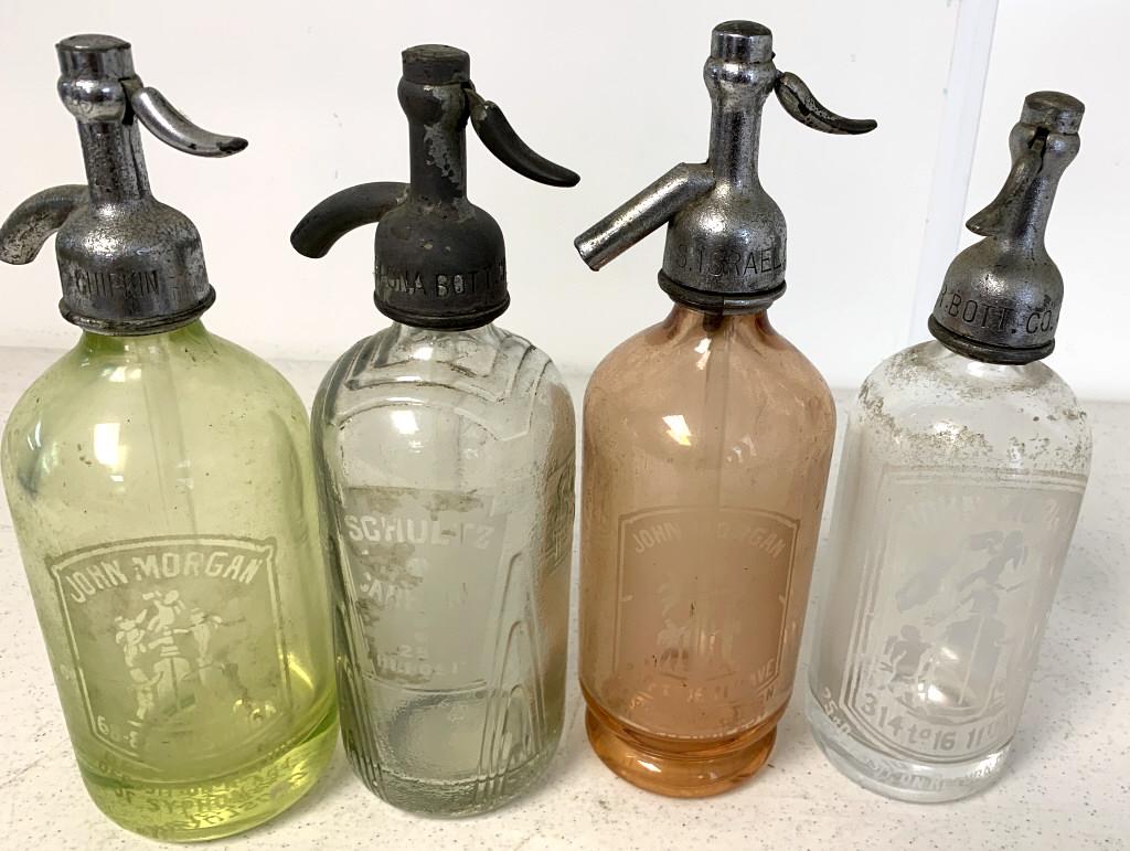 Lot of 4 Seltzer Bottles Pink/Green/ Clear: Pink /Green Clear (1) John Morgan (1) Clear=Shultz These 4 Bottles are smaller in size