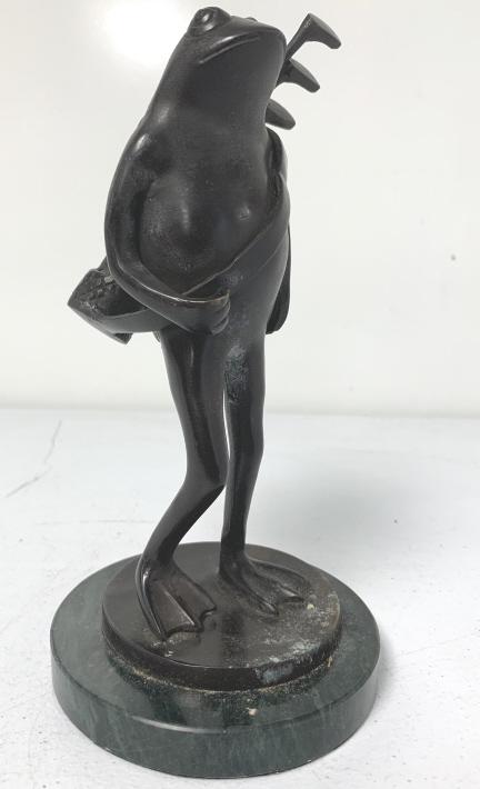 Bronze Looking Frog Statue w/ Golf Clubs: mounted on a piece of jade looking material, some spotting near arm and body, no names or markings