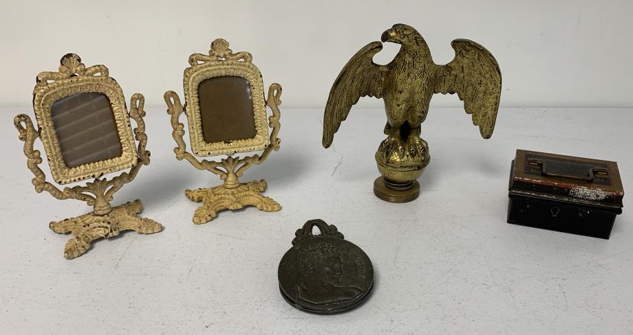 lot of 5 Tin Box, Eagle, Greece Clip, others: Eagle is heavy and probably was on the end of a flagpole, tin box has paint wear throughout, clip could be bronze and is marked Olympia Greece and has some patina, pair of picture frames has paint wea