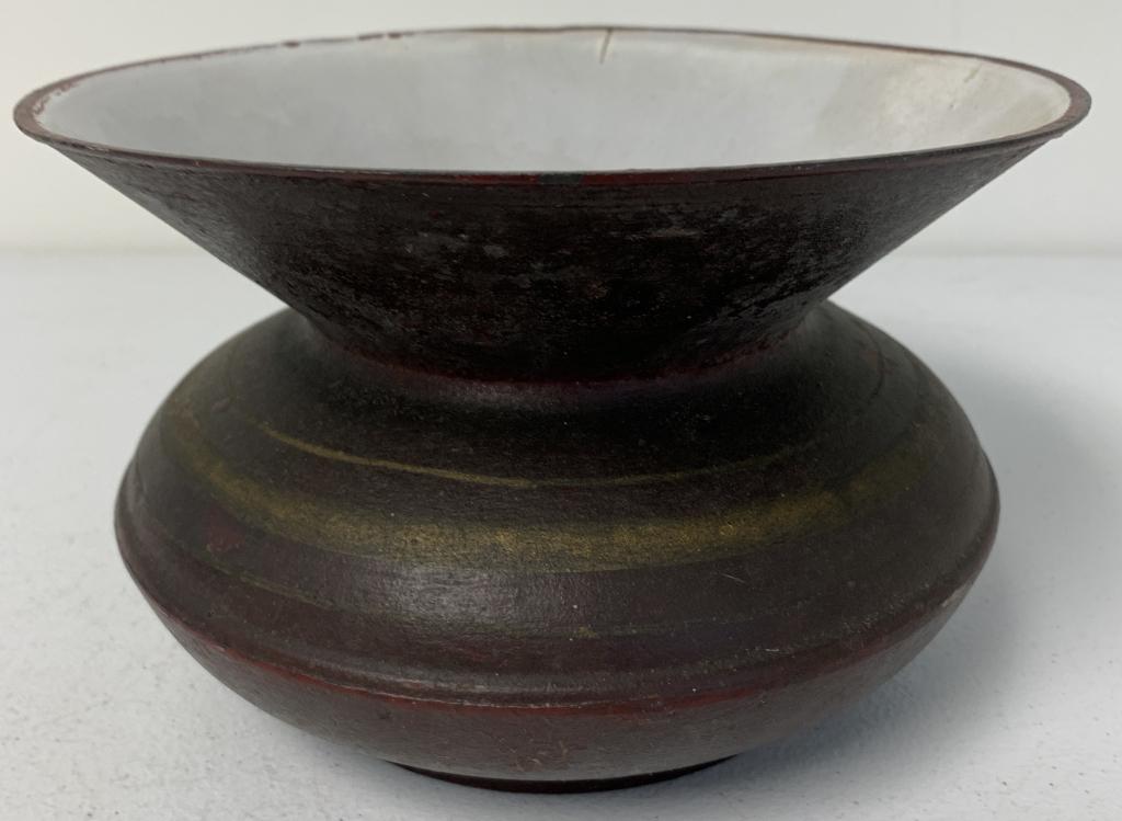 Heavy Metal Spittoon: cast iron feeling, porcelain or enamel looking on the inside, red color and painted accents has a lot of wear on outside of spittoon