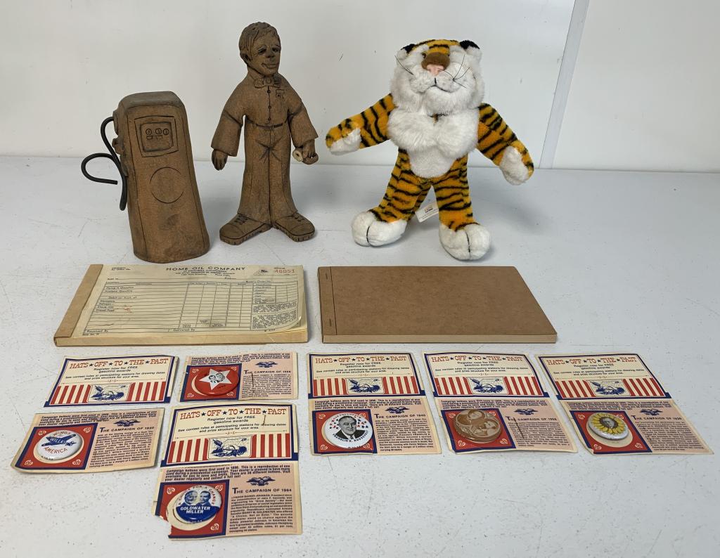 10+Oil Co Items American Oil, Exxon, Home other: stuffed Exxon tiger, gas pump and gas station attendant are pottery like, attendant is broken at hand, Home Oil Company blank invoices,American Oil Co is numerous campagin buttons, all have wear