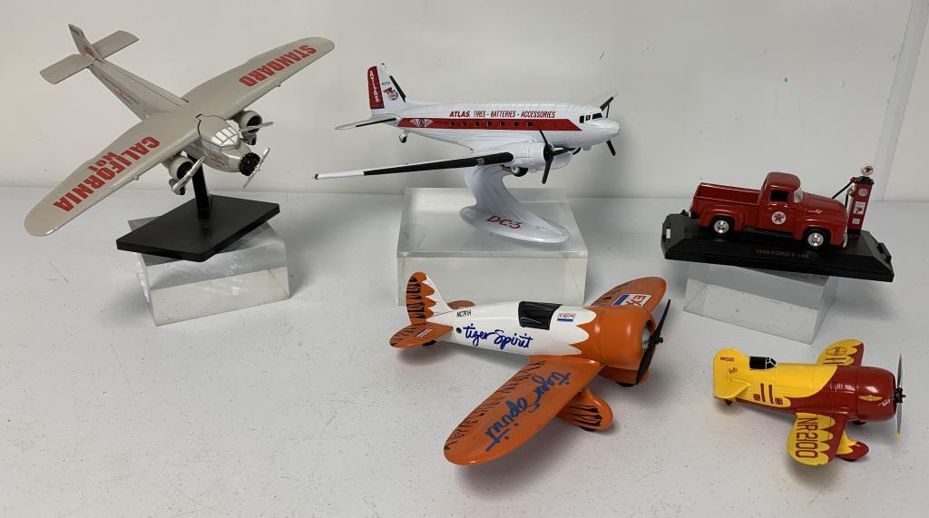 lot of 5 Exxon, Standard, Atlas, Shell Planes othe: Texaco pickup truck, Atlas & Standard planes includes stands, all toys are metal