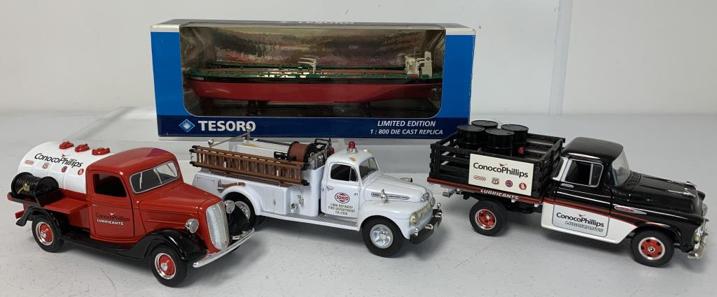 lot of 4 SpecCast Trucks & Tesoro Boat: some of the trucks may be missing their riew view mirrors, Tesoro Ship is marked 1 of 800