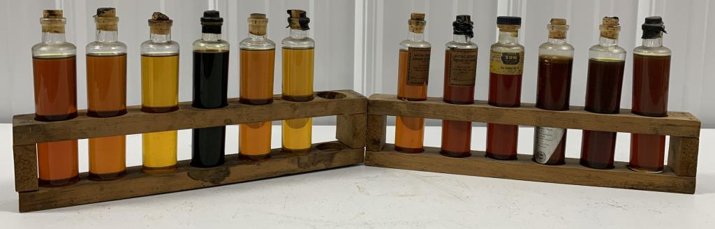 lot of 2 Racks w/ Glass Bottles of Oil (1 of 5)