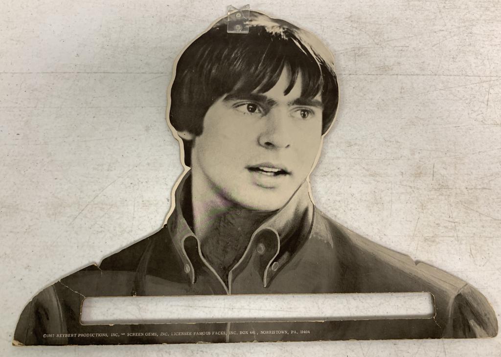 Cardboard Davy Jones Clothes Hanger: some cracks on Davy's picture, plastic piece on top of Davy's head is broken