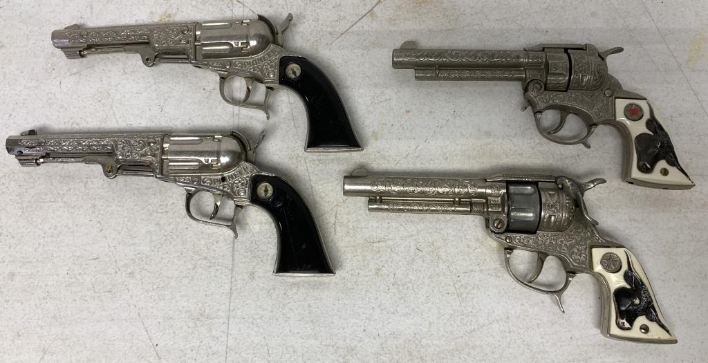 lot of 4 Pioneer, Texan, Texan Jr Cap Guns: possibly been used at one time, one of the Pioneer has a compass that does not work