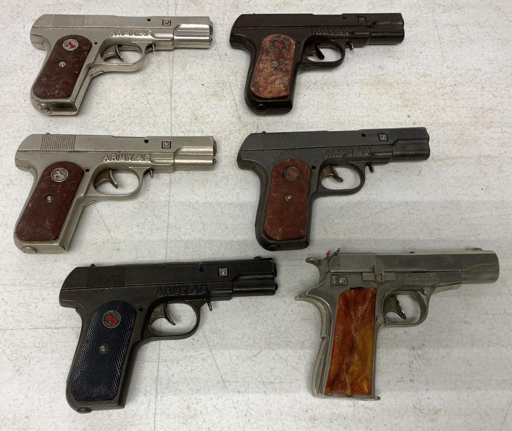 lot of 6 Army 45 & Hubley Automatic Toy Guns: all are metal with plastic hand grips, Hubley has a lighter fell than the Army 45's, all have wear