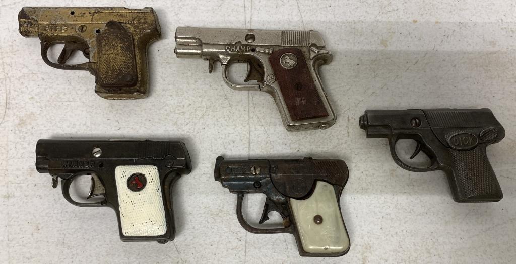 (5)Rex, Biff, Dick, Champ, Winner Toy Cap Guns: all are cast metal, Champ & Rex have plastic handle grips, all guns have wear
