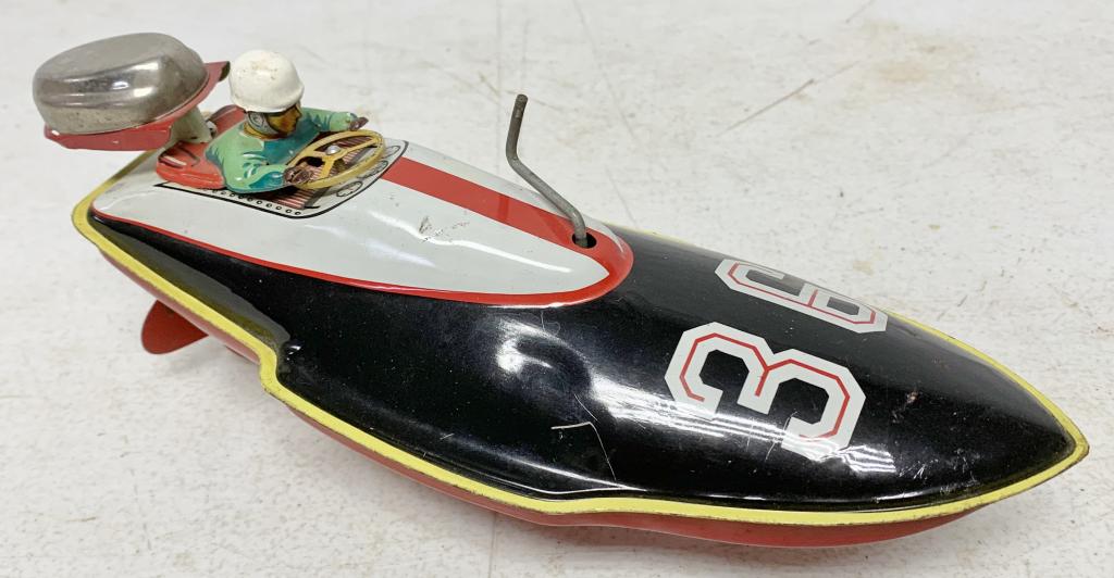 Marusan Tin Boat Toy: some scratches throughout, couple of small dents on top