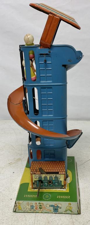 Tin Wind Up Toy w/ People Going up a Building: untested, no names or markings, comes with two people, some wear and a couple of scratches