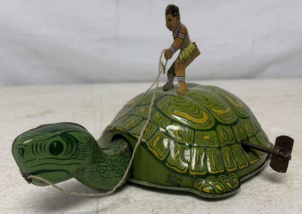 J Chein Wind Up Turtle: wind up mechanism is untested, light paint wear especially on the underside along with some scratches, some discoloring of lithograph due to aging, some rust at tail