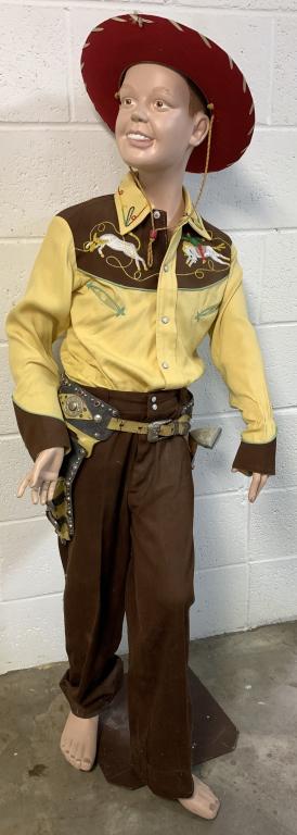Roy Rogers Child Mannequin on Stand: hat, outfit & guns marked Roy Rogers, hard resin type material, 55" tall, right arm is broken at shoulder and does not want to stay in the body