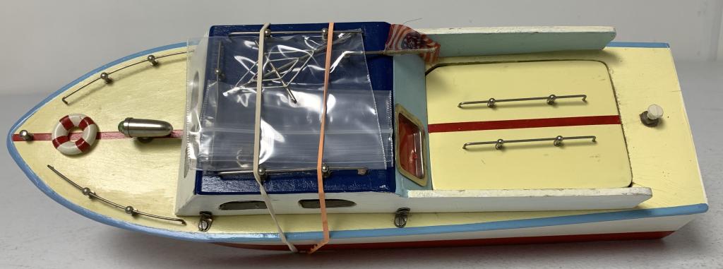 Battery Operated Wooden Boat: untested, comes w/ antennae that is not attached, light paint wear and rub a few rub marks on stern, stamped Japan on rudder