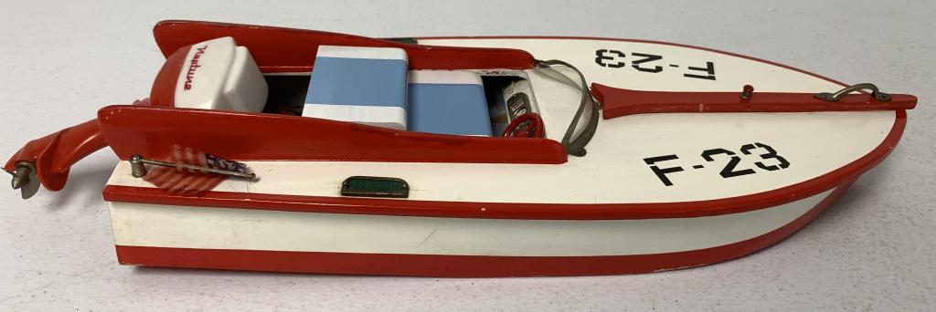Neptune Battery Operated Wooden Boat/Motor: untested, outboard motor only attached to boat by a couple of wires, a few paint chips along edges, some red touch up paint on bottom, no other markings