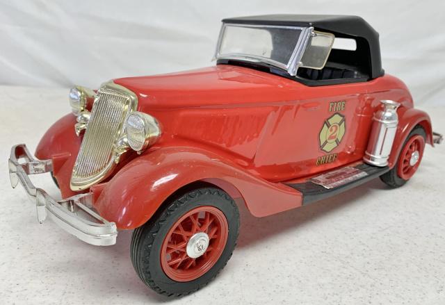 Beam Fire Dept, Car: decanter is empty, spare tire is broken off the back of the trunk