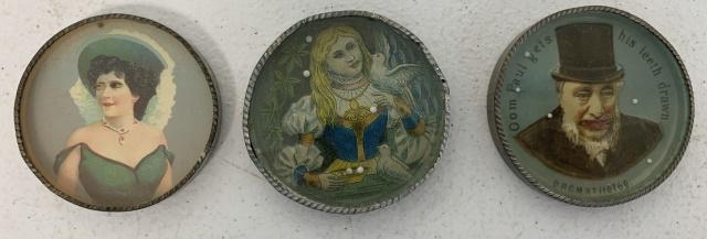 3 dexterity puzzle/pocket mirrors: Oom Paul gets his teeth drawnis marked DRGM and has minor mirror loss, girl w/ bird is marked DRGM, metal is out of round and mirror has loss, Victorian woman mirror has paint loss and chip