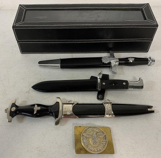 lot of 4 Nazi Daggers, Sheaths, Belt Buckle: authenticity unknown, some marked RZM, one marked M7/14, one marked M7/38, one sheath has tip of blade exposed