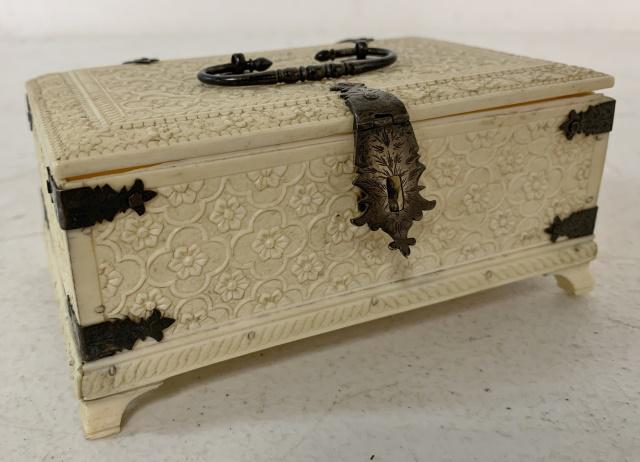 Plastic Type Trinket Box: tarnish on hinges and fixtures, the one foot & brace has been repaired