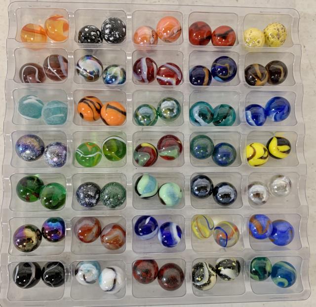 lot of 70 Glass Contemporary Marbles: paperwork inside case says they are from Mega Marbles ID set, all are 5/8" diameter