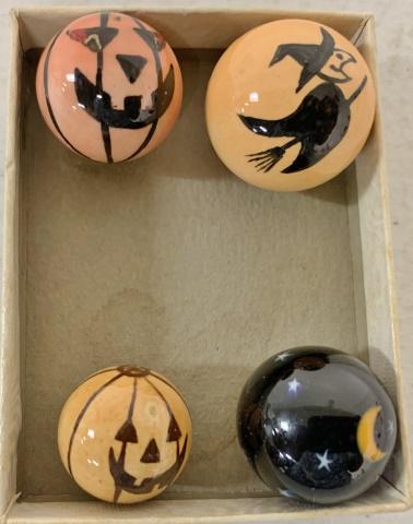 lot of 4 Halloween Glass Marbles: witch marble is about 1/16" diameter and is marked 60 WN on back, jack-o-lantern is about 15/16" diameter and is marked NM 04