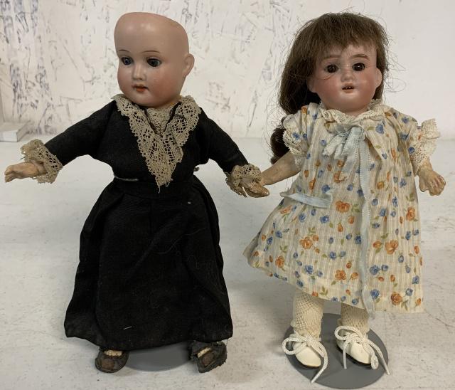2 bisque German head dolls one marked Trebor (1 of 5)