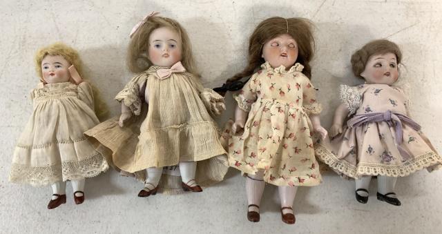 4 small bisque dolls two w/sleepy eyes (1 of 14)
