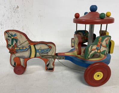 N.N Hill Brass Co., Hill Toys and Bells pull toy: horse pulling carousel, nice condition, but has foxing to paper litho