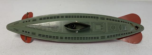 Wolverine Metal Submarine: sub has some weight for its size especially in the keel, some worn paint at a number of spots