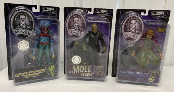 3 Universal Studios Monsters action figures: This Island Earth mutant, the Mole People, The Hunchback of Notre Dame; 2 are Toys R Us exclusives, all sealed on package, but Mole People plastic has torn away from backer near hook, two cardboard ho