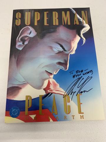 Superman Peace on Earth graphic novel: Written by Paul Dini. Illustrated by Alex Ross. Autographed to Bob by Alex Ross. Published 1999. Does not appear to have been opened to read
