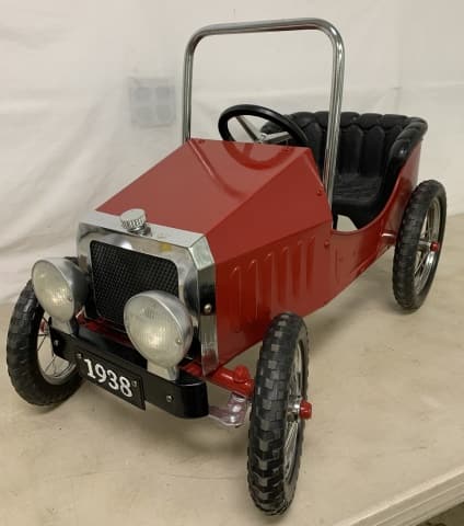 Reconditioned Old Style Pedal Car: pressed steel, 1938 license plate on front, some pit marks on top of radiator, seat is hard plastic, spongy rubber tires, 33" long X 21" tall