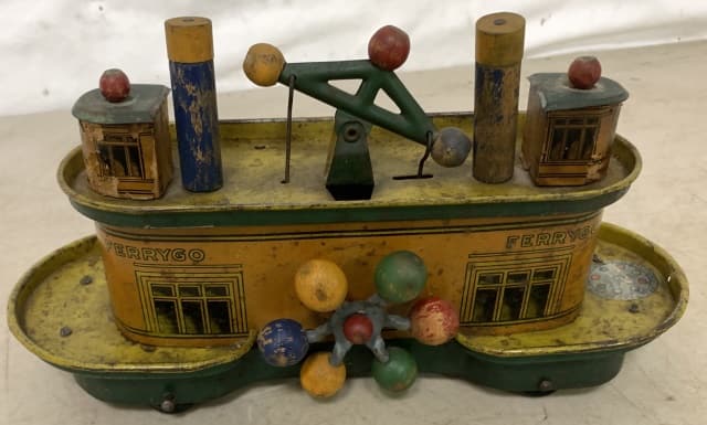 Go Toy Manufacturers tin Ferrygo: shows scratches,dirt, dings,paint loss,paper loss; missing drive band