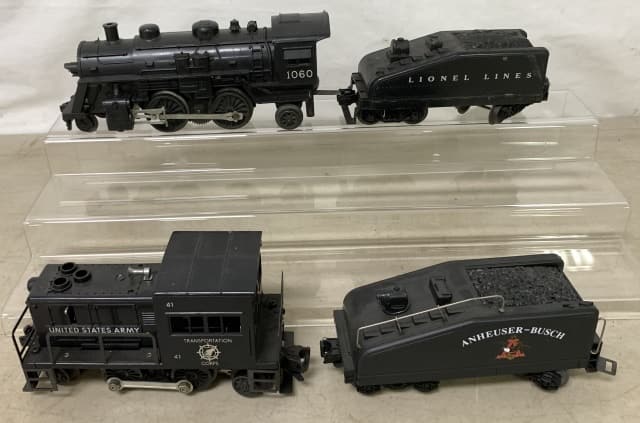 lot of 4 Plastic Lionel Engines & Coal Carriers: all with light wear and are untested, a little over 1" width between the wheels