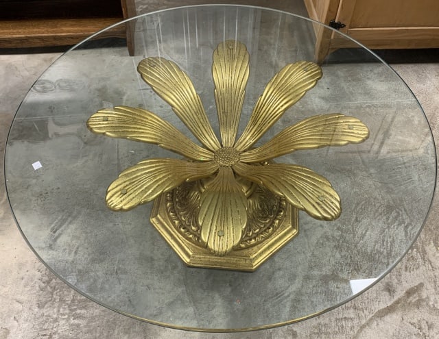 Hollywood Regency Blossoming Flower table: metal base with round glass top, some scratches to gold gilt; 40" wide x 14.5" tall