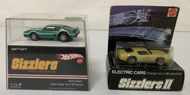 (2) Hot Wheels Sizzlers & Sizzler s II Cars: both look like they have never been opened, cardboard box has some damage