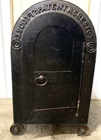 J.Scott's Patent Asbestos Safe: NO SHIPPING; no key for lock; 39" tall x 19.5" deep x 25" wide w/wheels, has rust and some damage to opening trim as well as wood shelf pieces missing