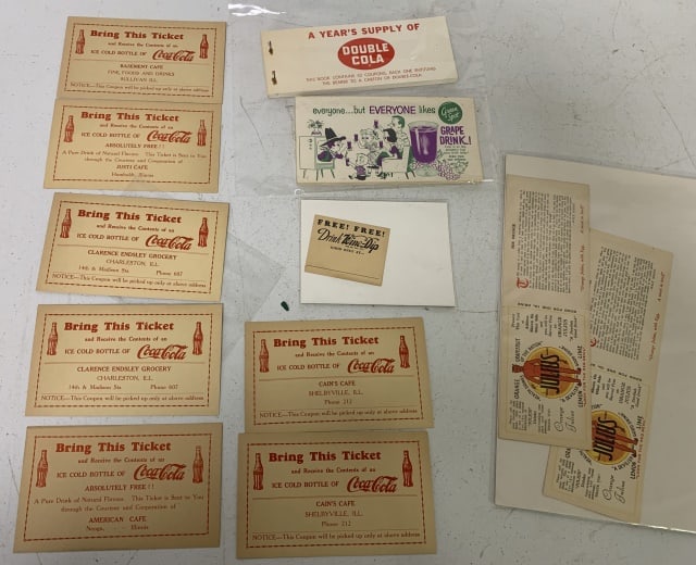 12 tickets or ticket pads for beverages: Coke, Green Spot, Double Cola, Orange Julius and Wine-Dip