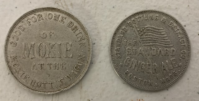 Moxie and The Standard Ginger Ale trade tokens: with scratches and wear