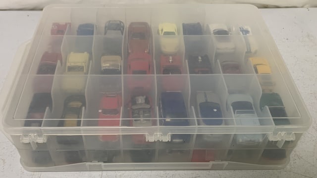 case of 48 diecast cars: includes Johnny Lightning, Matchbox, Hotwheels and Yatming