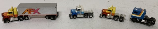 4 Tyco and Aurora slot semi trucks: see photos for condions, one missing wheel