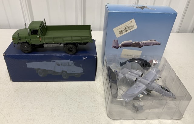 (2)Jackiekim Truck & Thunderbolt II Plane: plane is 1/100 scale and has a couple of broken missles that are not attached to the belly of the plane, military truck has die cast body and plastic sides and top and is 1/36 scale