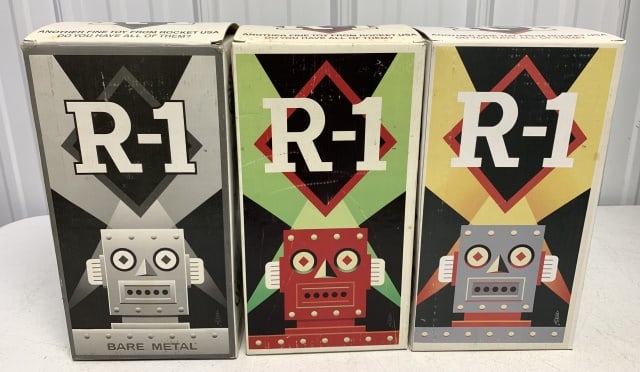 lot of 3 Rocket USA R-1 Bump N Go Robot One: tin, bare metal, look unused, untested, some wear on boxes, one is red