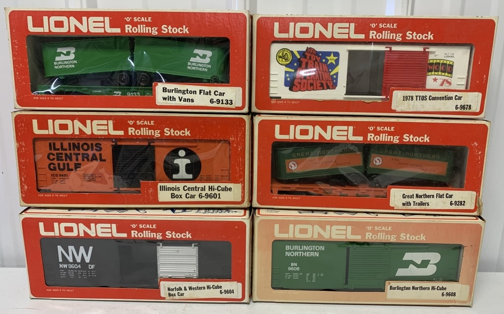 6 Lionel cars: O gauge; illinois, Norfolk & Western and Burlington Northern Hi-Cube box cars; Burlington and Great Northern flat cars w/trailers; 1978 TTOS Convention Car; boxes have wear and damage