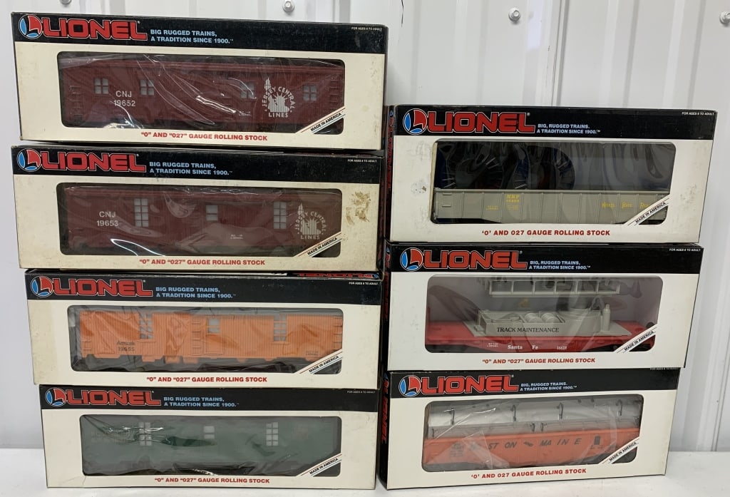 7 Lionel cars in boxes: O gauge: boxes have wear and soiling; Jersey Central Bunk car and tool car, Amtrak and Southern Tool cars, Nickel Plate Road and Boston & Maine Gondolas with Coil Covers, Santa Fe Track Maintenance ca