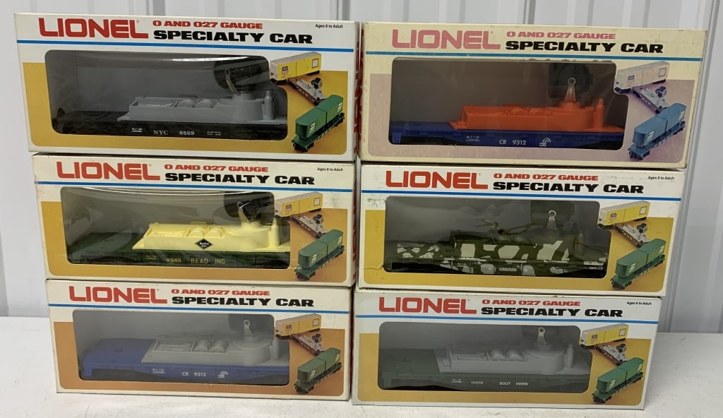 6 Lionel Searchlight cars in boxes: O and O27 gauge; boxes have wear and some damage; NY Central, Reading, Conrail, U.S. Marines and Southern