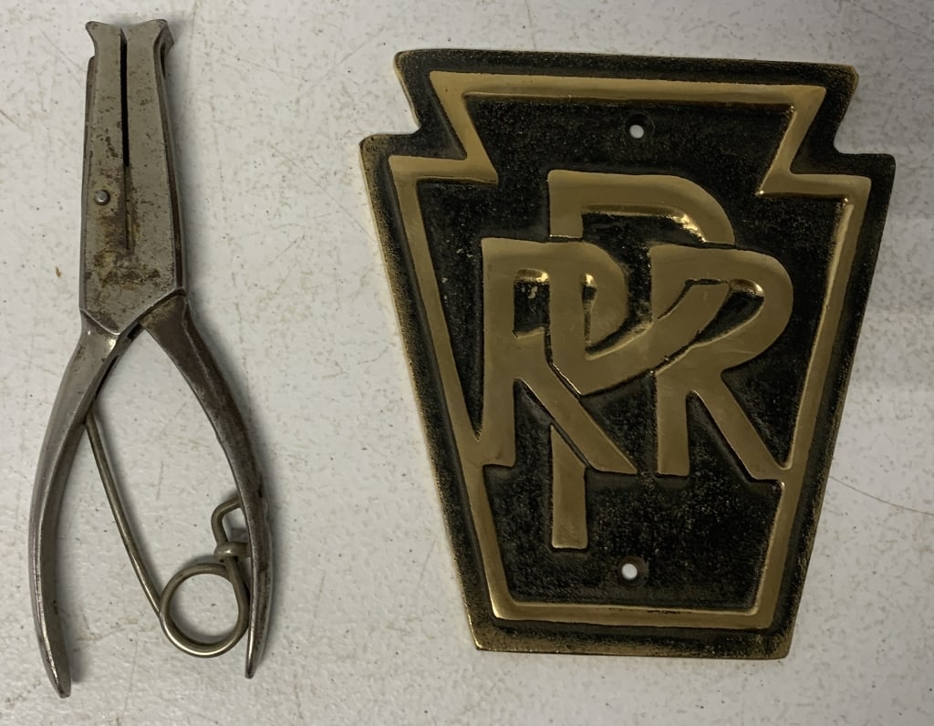 ticket punch and PRR brass plaque: plating is worn off punch