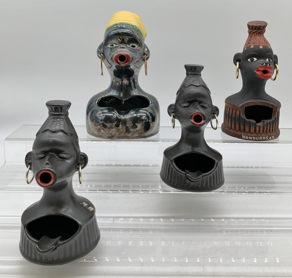lot of 4 Black Americana Ashtrays: one marked Honduras, may be contemporary